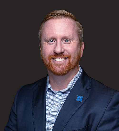 Development Director,
Tom Hanratty