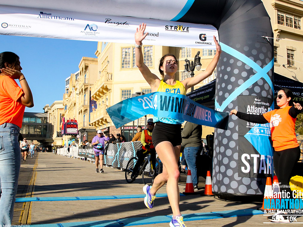 PETA Pack runner crosses the finish line in first place at the Atlantic City 10K