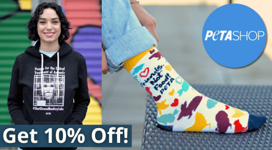 woman wearing PETA hoodie next to person wearing PETA socks