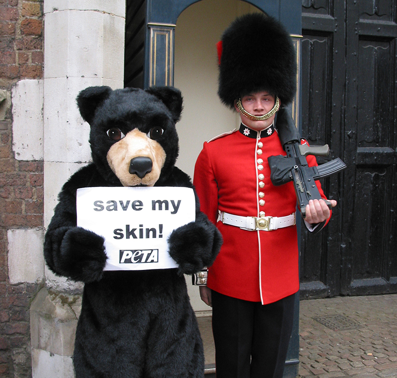 photo of guard with PETA demonstrator