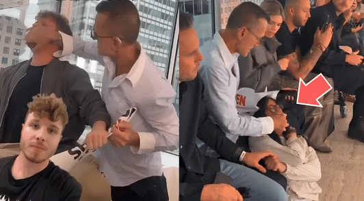 man holding hand over activists mouths