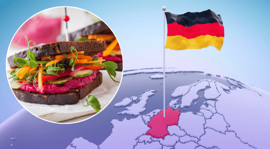 flag on the country germany on map next to image of a veggie sandwich
