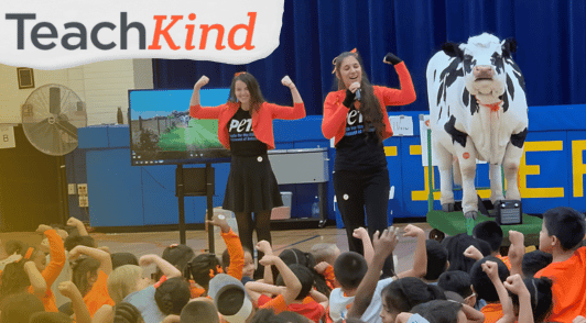 Carly the cow at a school