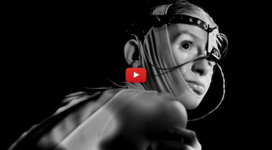 person posed as a test subject with device on head