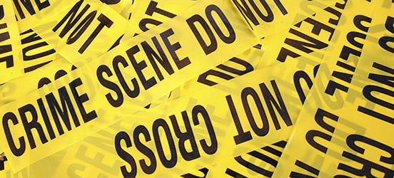 Crime scene tape photo by Flickr user anoushdehkordi. Used via Creative Commons Attribution 2.0 Generic (CC BY 2.0) license.