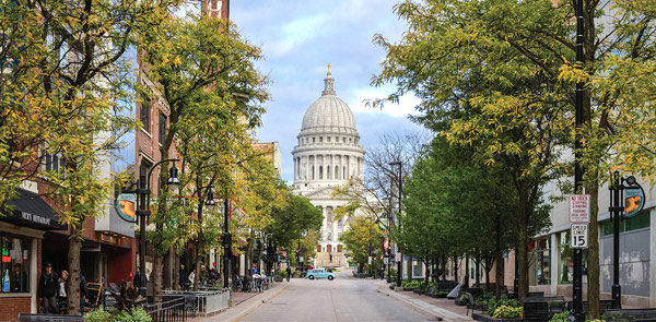 View down a street to a capitol building