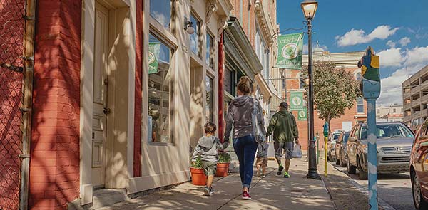 Family walking down main street