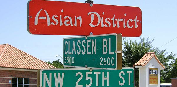 Street sign reading Asian District