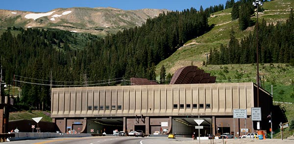 Tunnel entrance leading into mountains