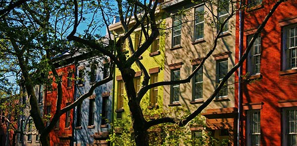 exterior of rainbow colored townhouses