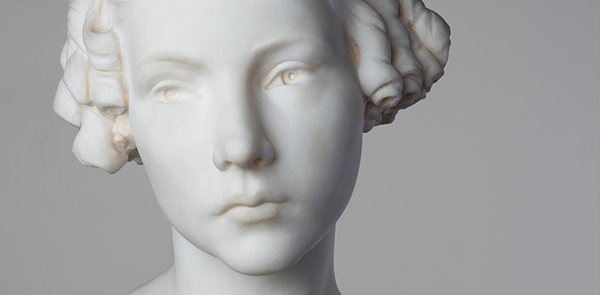 white marble sculpture of a girl