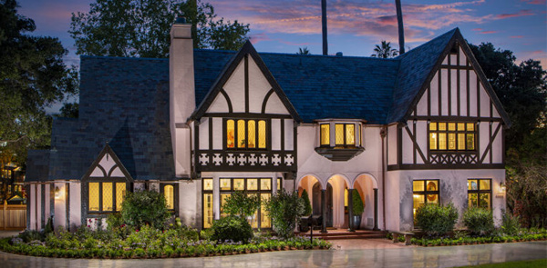 tudor building with the lights on