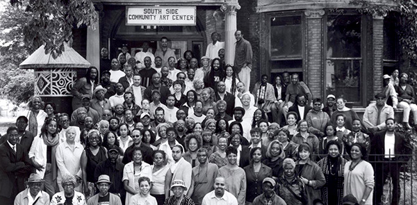 Black and white photo of people in front of the South Side Cultural Arts Center