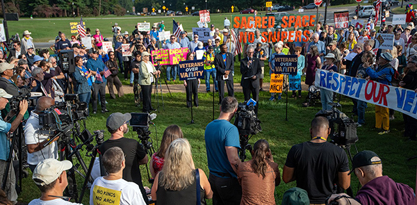 National Trust staff members attended a press conference outside Memorial Circle, the site for the proposed Triumphal Arch. 