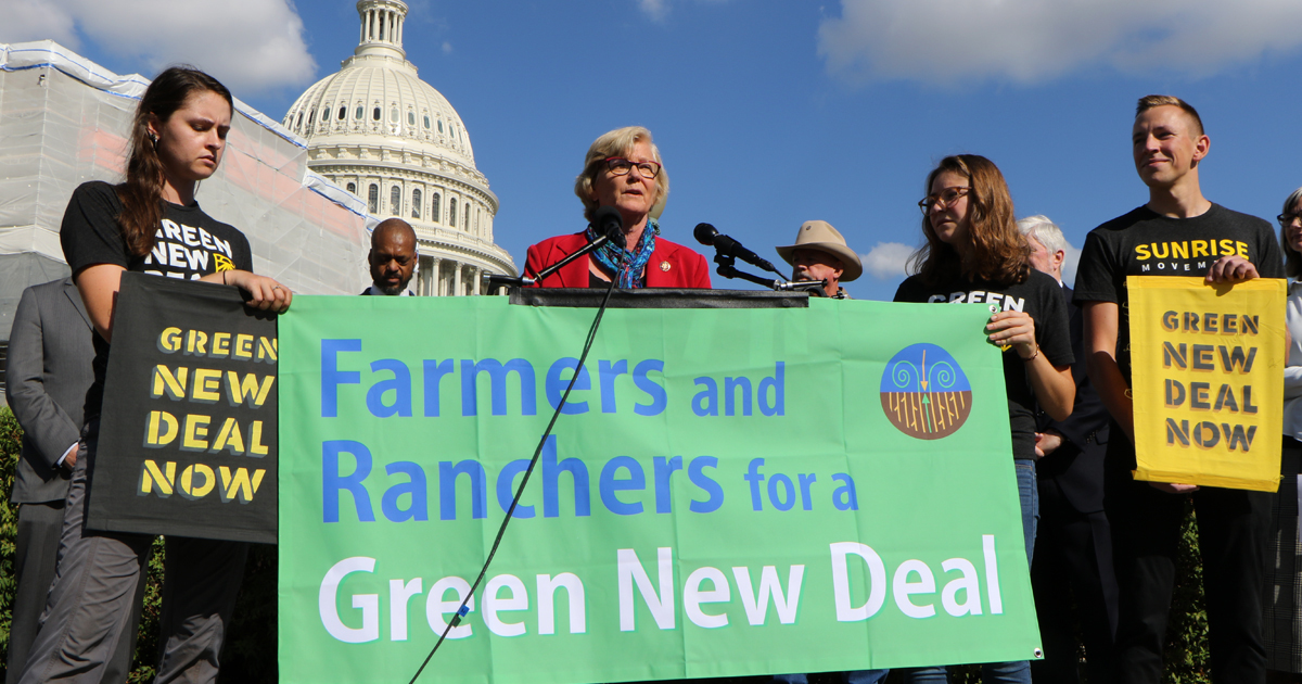 Congresswoman speaking at a press conference for the Farmers and Ranchers for a Green New Deal