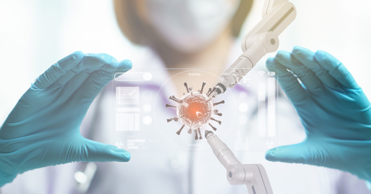 doctor in a hazmat suit holding a glass slide with a rendering of a coronavirus cell