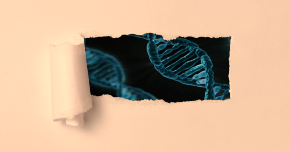 ripped hole in a piece of orange paper with dna gene strands showing through