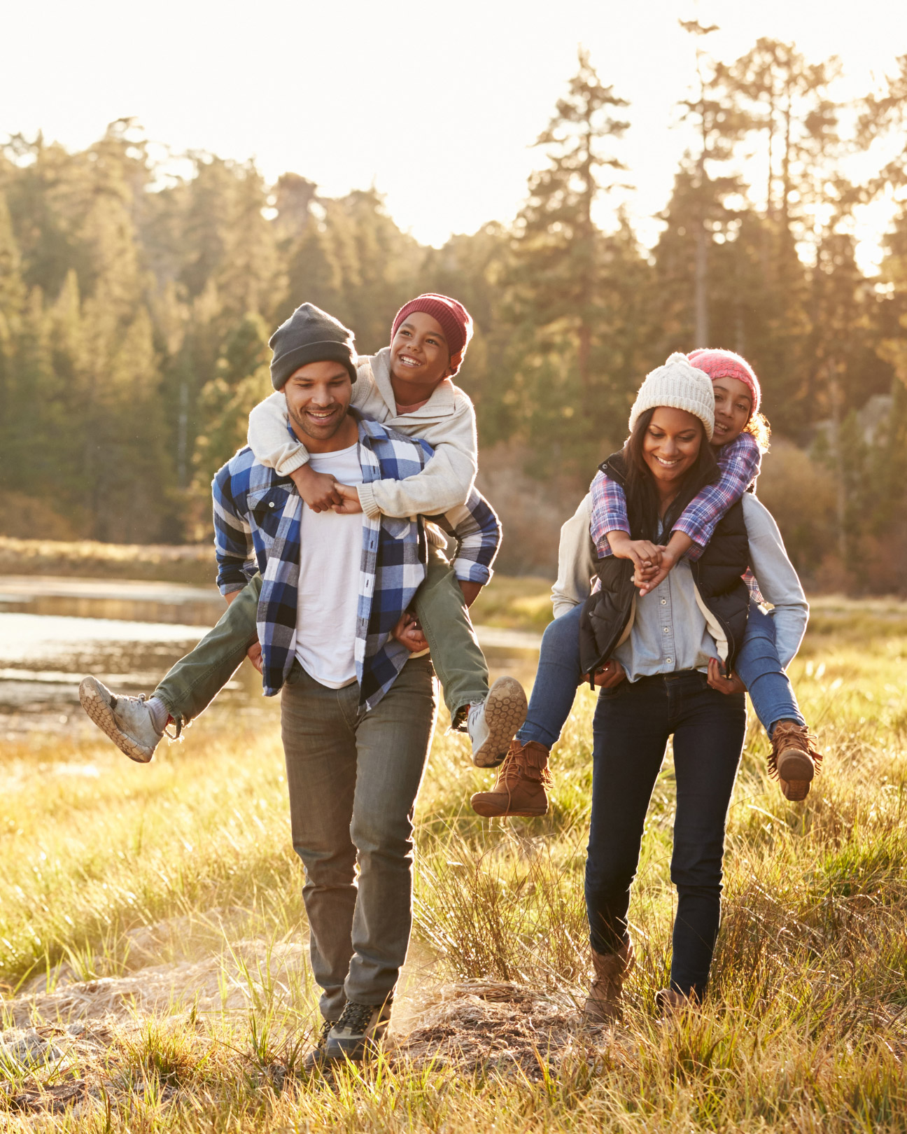 family walking through the woods