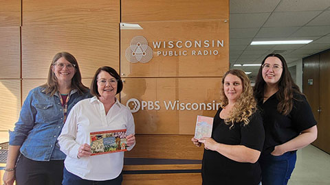 Four PBS Wisconsin staff members.