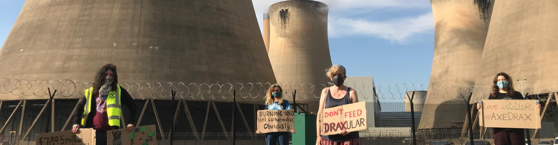 Protestors in front of Drax' UK power station where it burns forests from places like B.C. for electricity