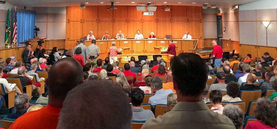 Residents gather at a Whatcom County Council meeting. Photo credit Henry Stewart Wood