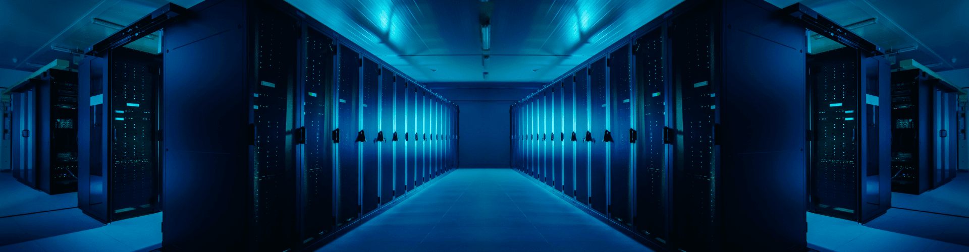a dimly lit data center with rows of servers