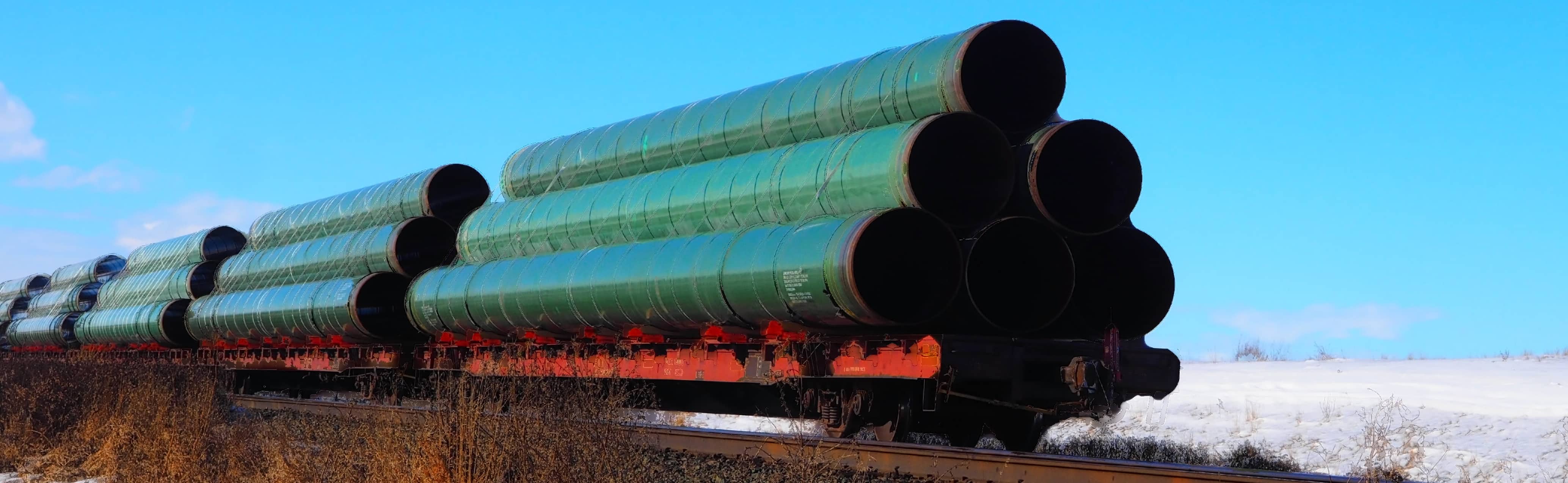 Trans Mountain Pipelines being transported by Rail