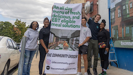 (From left) Tammy Reeves, founder of Resident Action Committee 2; Chef Z, TCG culinary director; Eli Moraru, TCG co-founder and president; Alex Imbot, TCG co-founder and CEO; and Onicah Maynard, also with Resident Action Committee 2, outside the TCG store