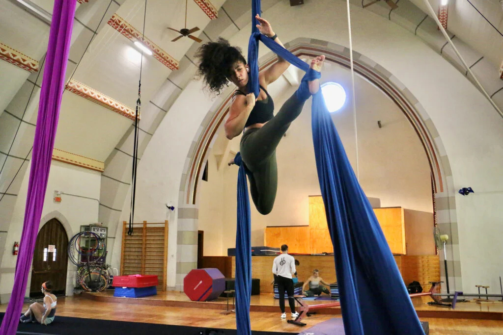 Students and instructors at the Circadium School of Contemporary Circus work out in the sanctuary of a former church in Mount Airy, which also houses the Philadelphia School of Circus Arts.