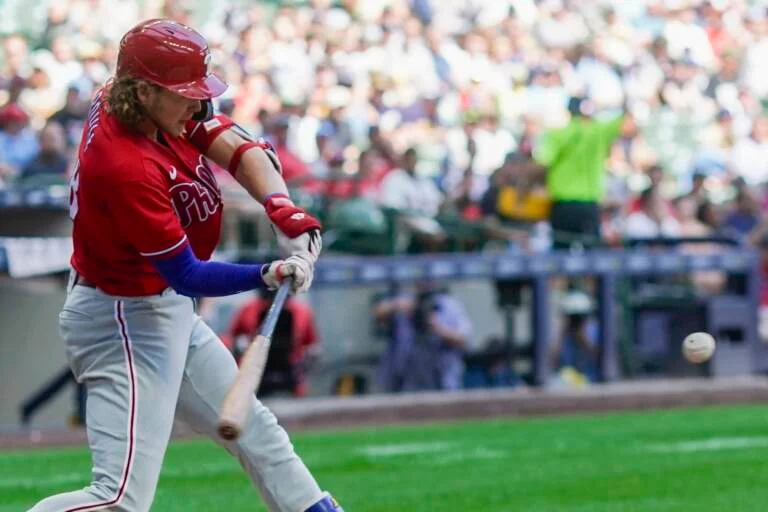 Philadelphia Phillies' Alec Bohm hits a home run during the seventh inning of a baseball game against the Milwaukee Brewers Sunday, Sept. 3, 2023, in Milwaukee.