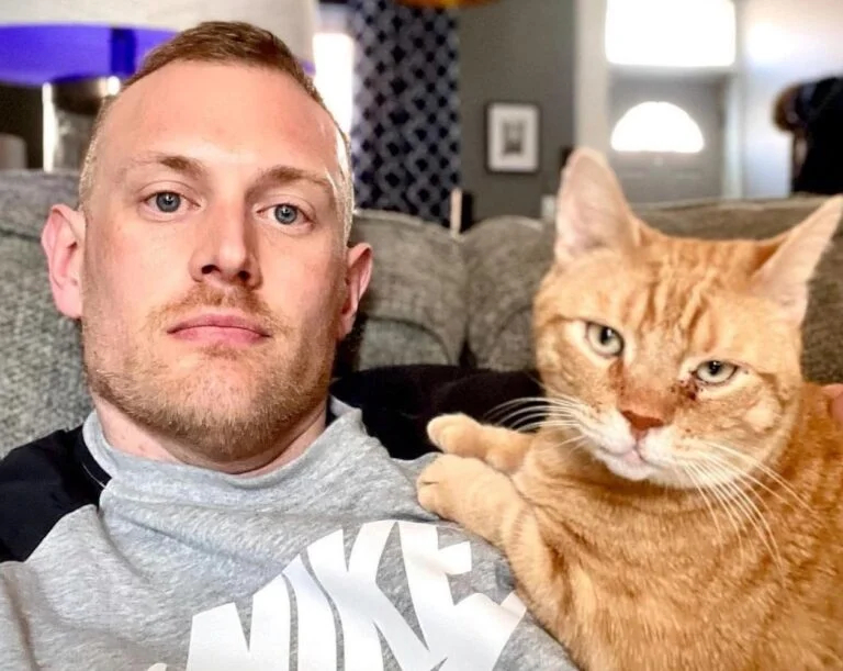 Josh Kruger and his beloved cat, Mason.