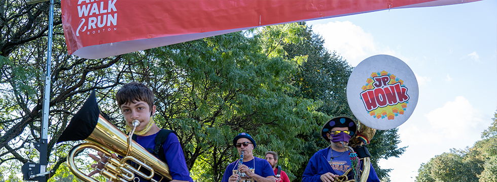 JP Honk Band members cheering on participants