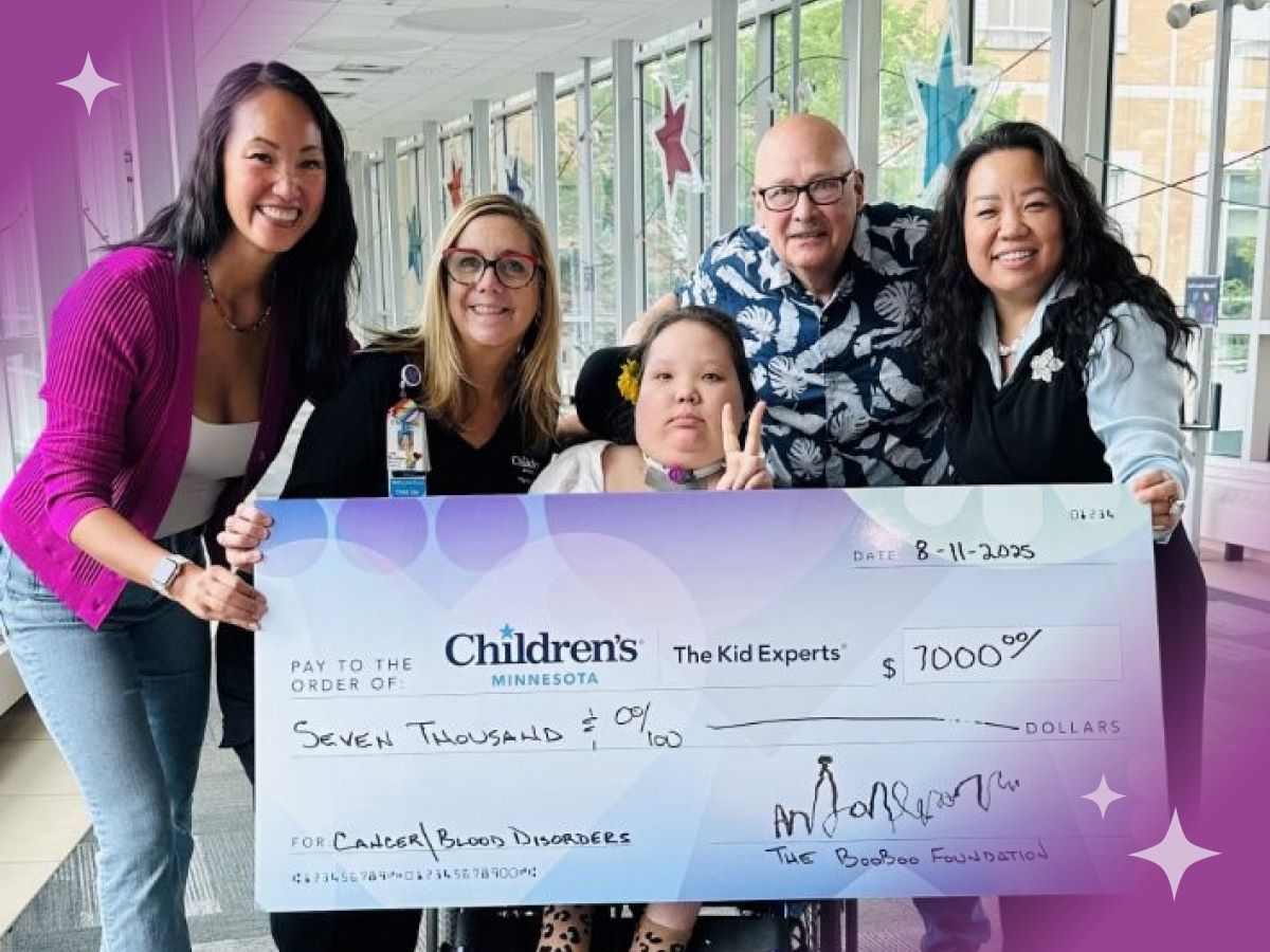 family with fundraising check