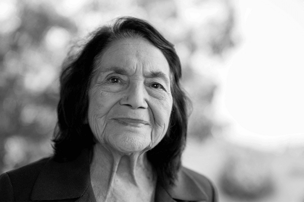 Dolores Huerta poses for a portrait outside the Dolores Huerta Foundation headquarters.