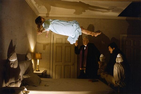 Linda Blair as Regan MacNeil levitating above her bed in The Exorcist.