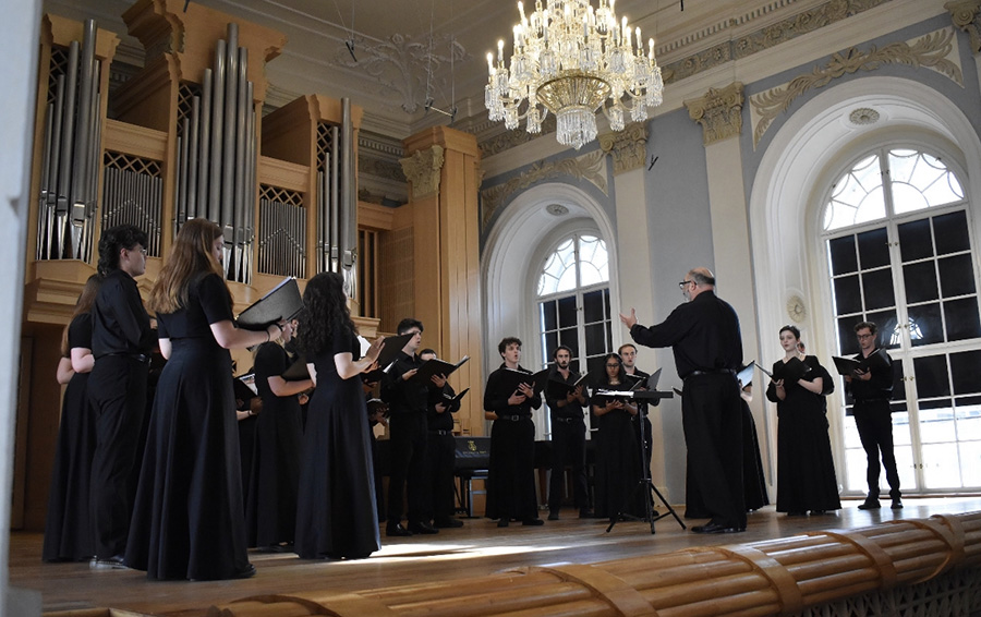 AU Chamber Singers performing at the Martinů Hall of Music and Dance Faculty of the Academy of Performing Arts, Prague (The Lichtenstein Palace)