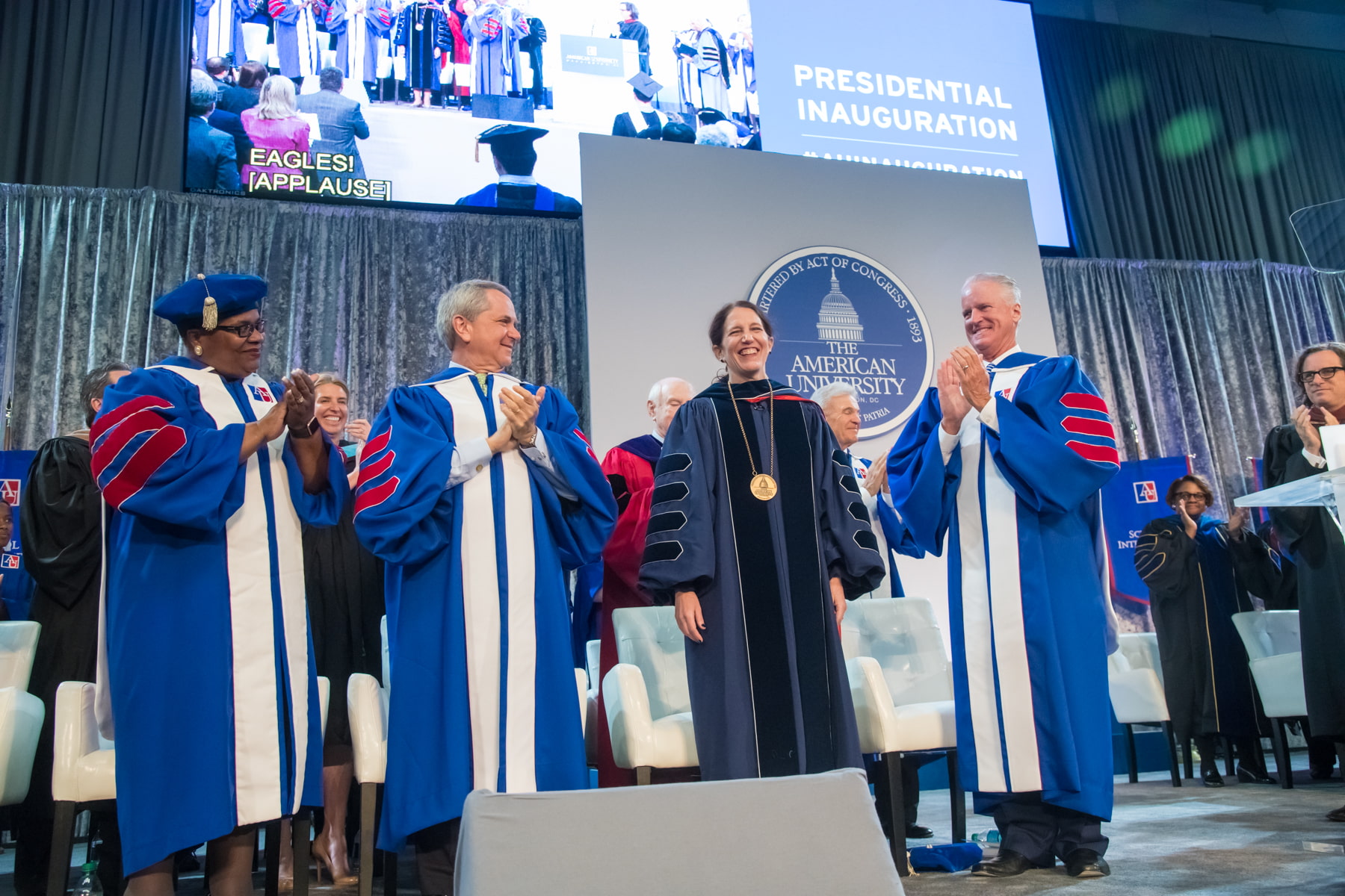 President Burwell in regalia with fellow administrators.