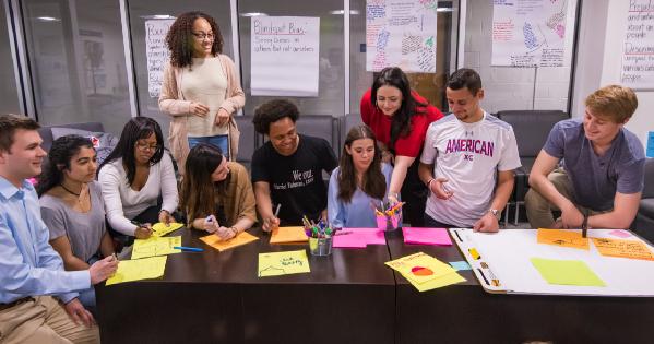 Students working together at a table.