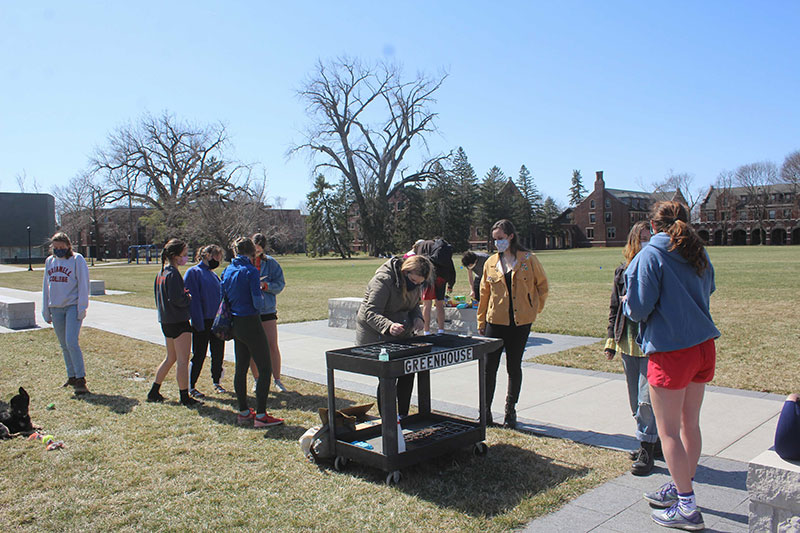 photo of young people on a campus outdoors