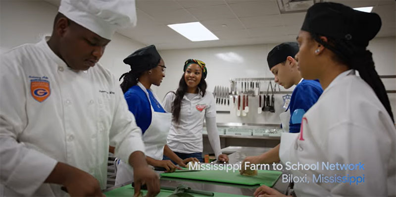 people working in a kitchen