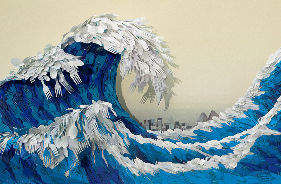 artwork depicting a wave, made from disposable plastic items