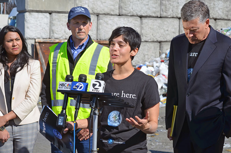 photo of a press conference at a recycle center