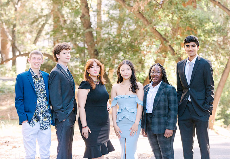 young people outdoors dressed snazzily