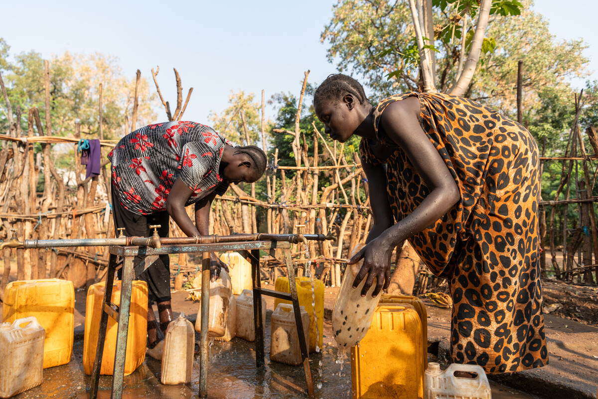 Women are seen using a water point by Oxfam in Jewi South Sudanese refugee camp, Gambella.