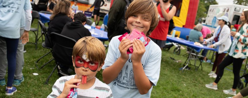 Two kids at the post-event celebration