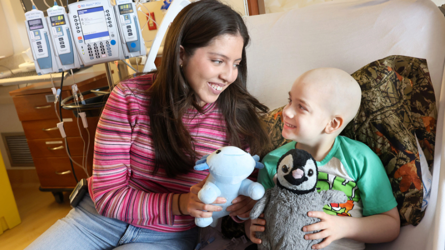 Celebrating Social Workers and Child Life Specialists Connor Young, 5  years old, with Jailine Hinojosa, Child Life Specialist, Family Services