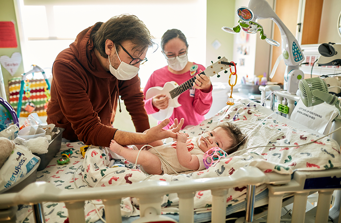Volunteers playing instruments from patient