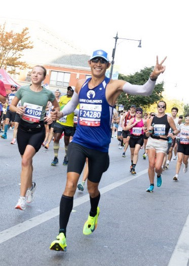 Marathon runner cheering