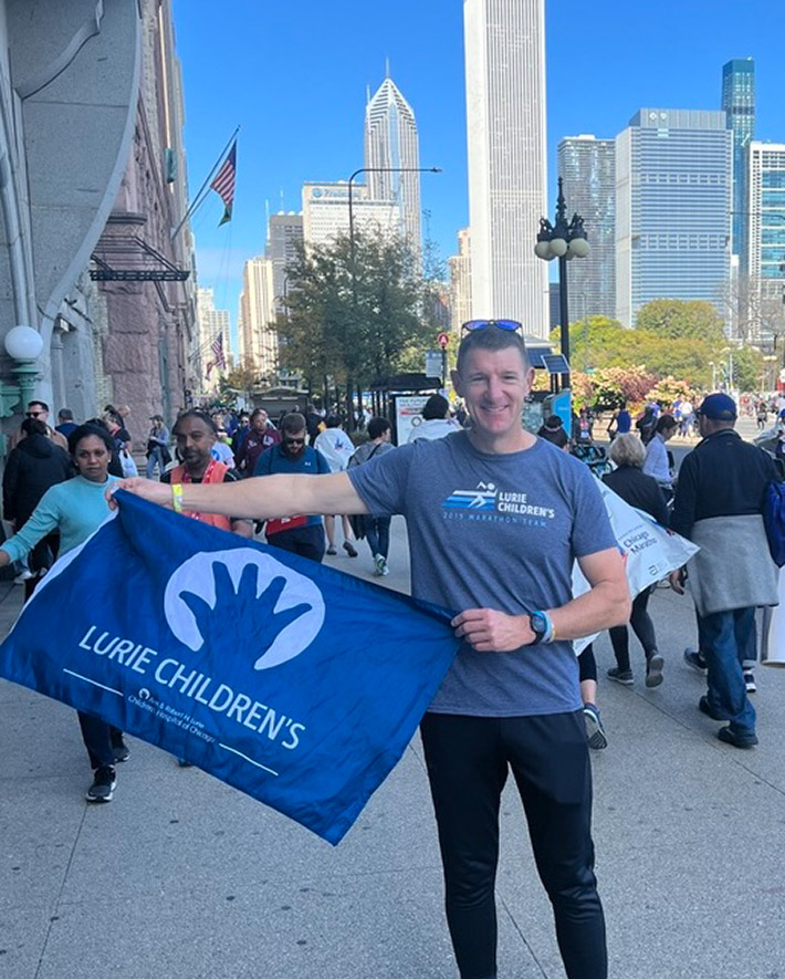 A runner holding a flag.