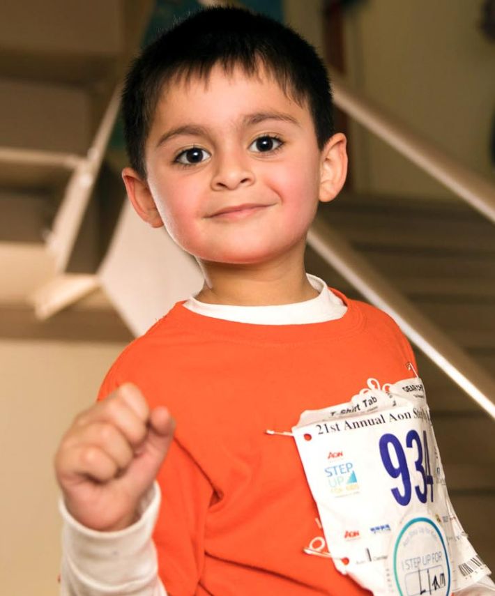 A child climbing up the stairs